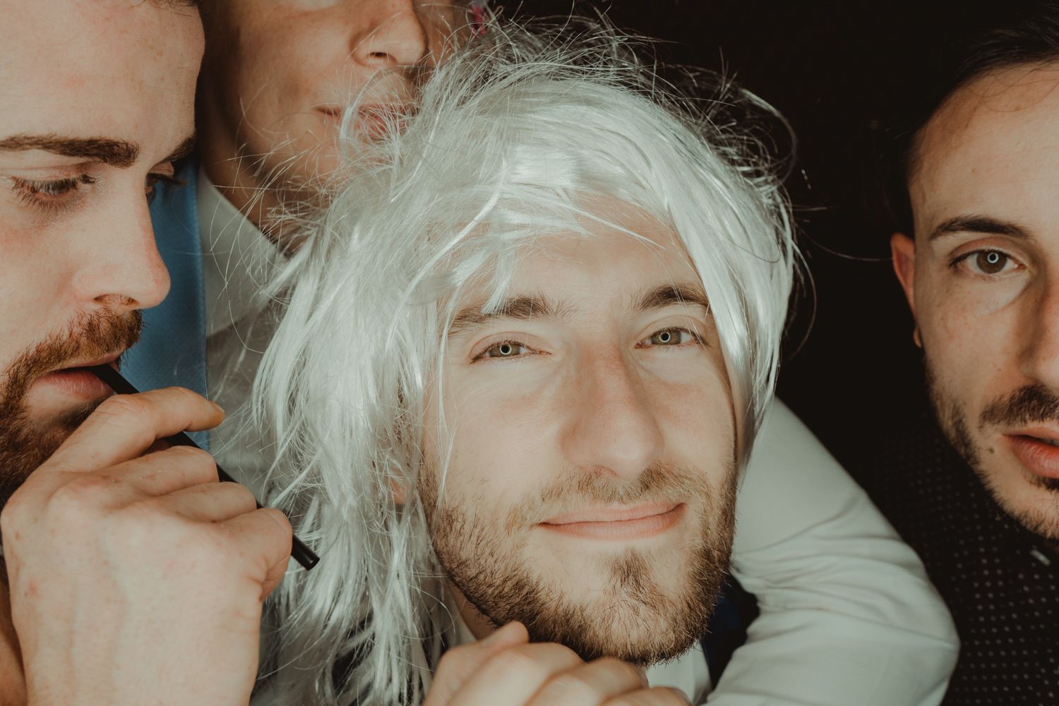 Candid photo booth moment captured by Portugal wedding photographer
