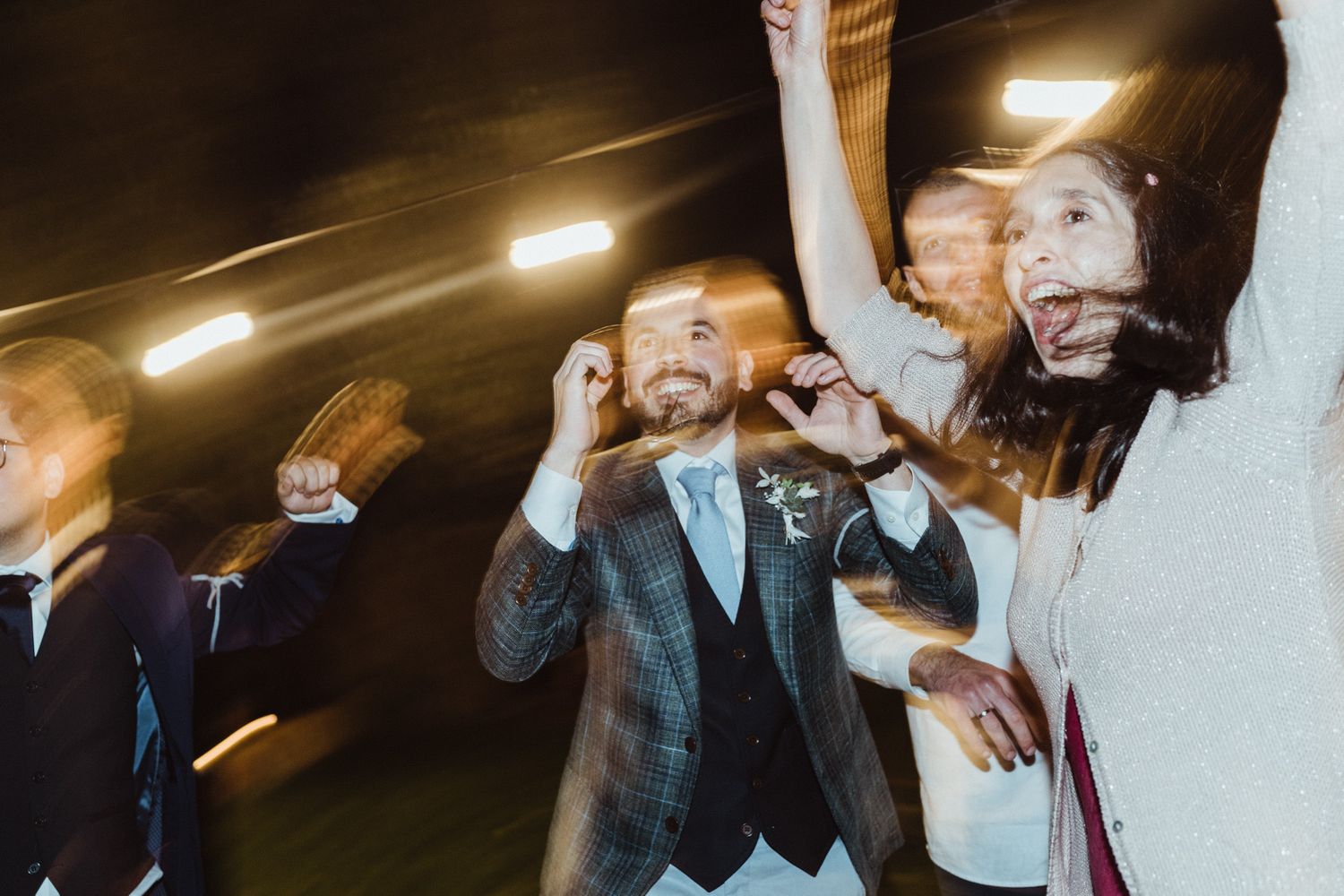 Wedding guests raising a toast during an intimate Porto wedding