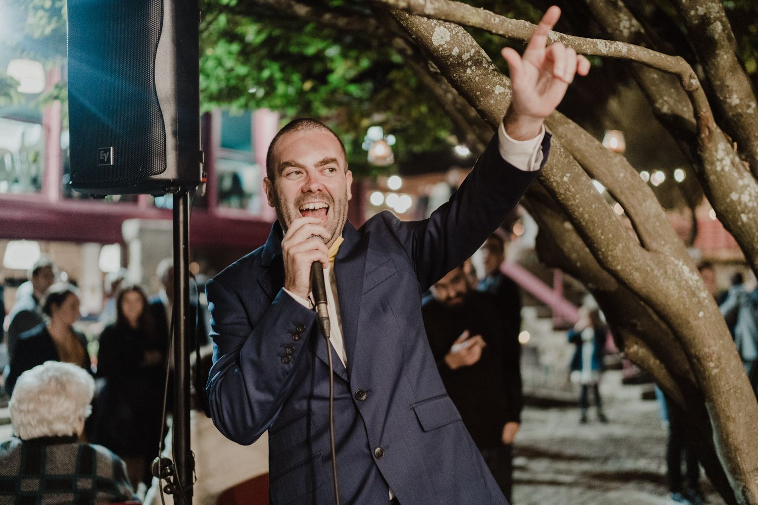 Wedding guest celebrating freely during an intimate Porto wedding