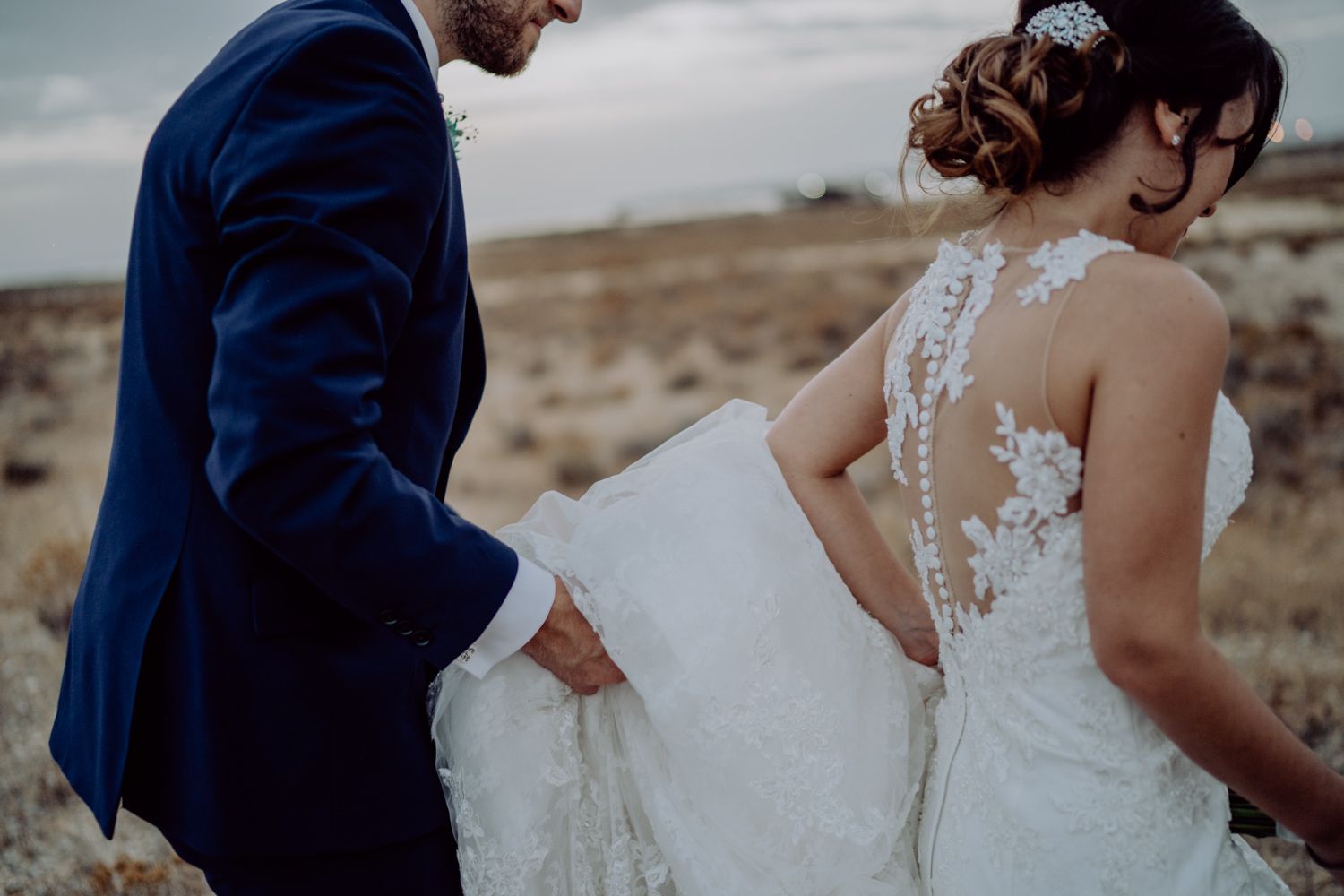 Emotional couple portraits by Algarve wedding photographer during golden hou