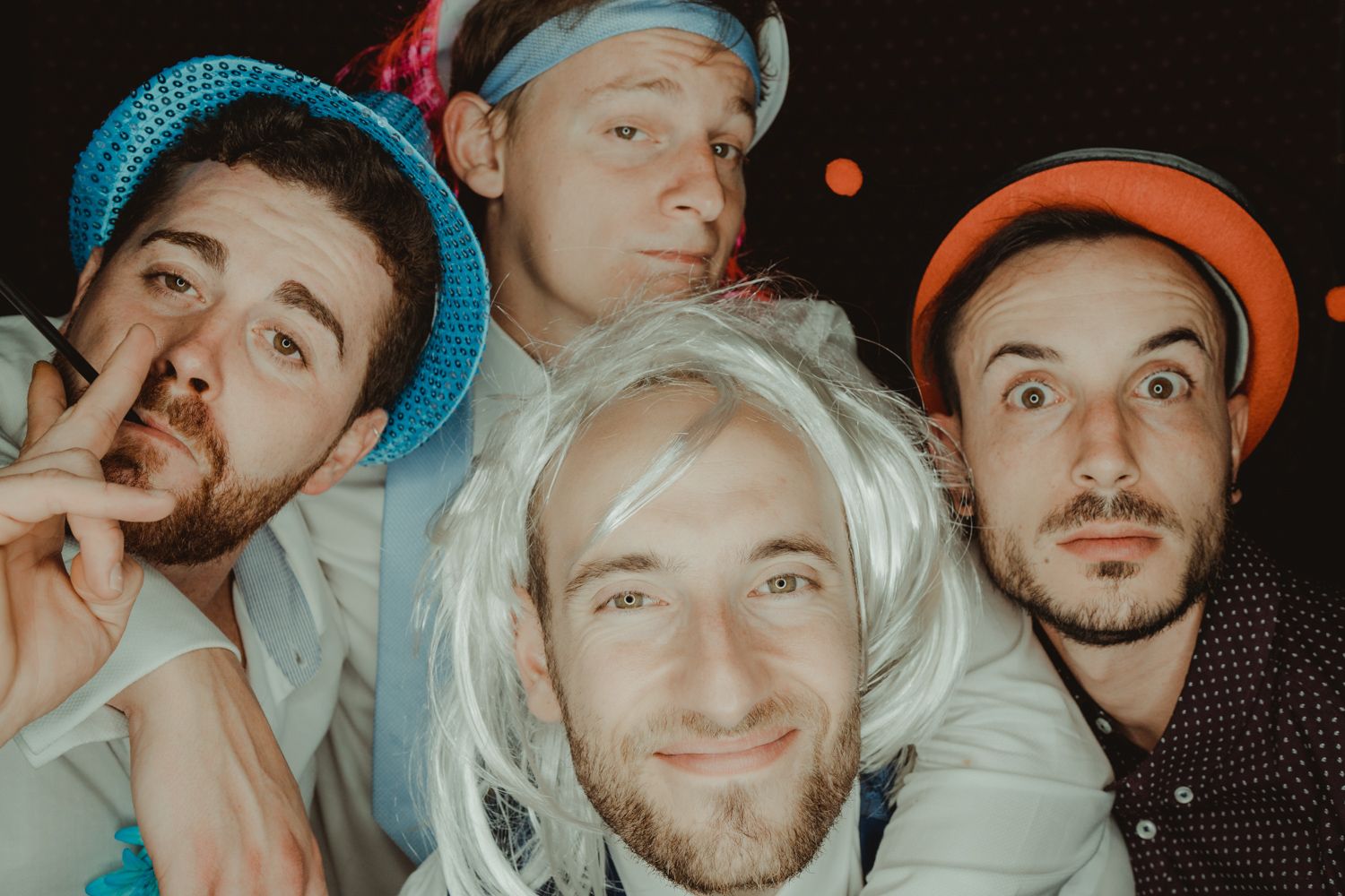 Candid photo booth moment captured by Portugal wedding photographer