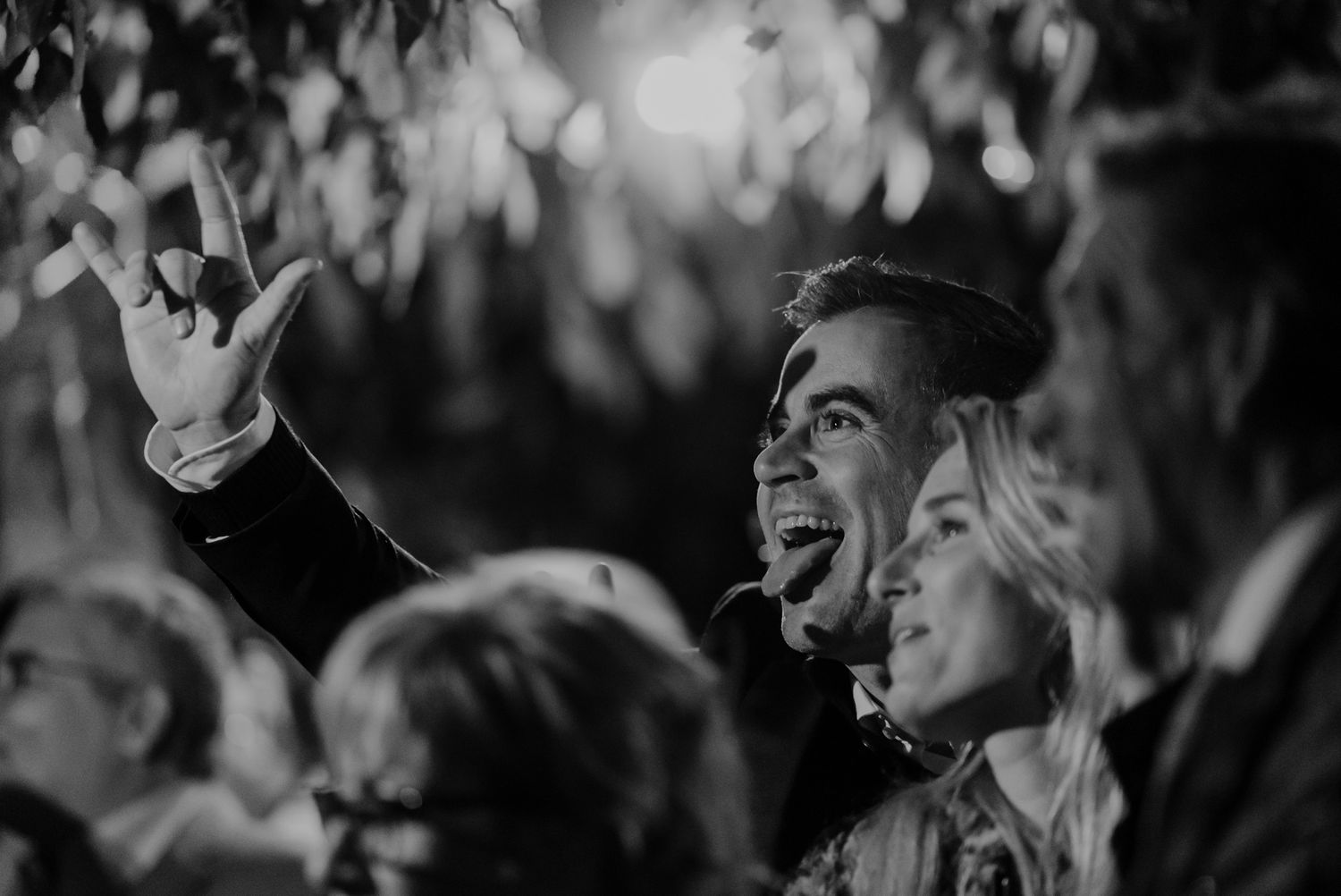Wedding guests sharing a joyful moment during an intimate wedding in Porto