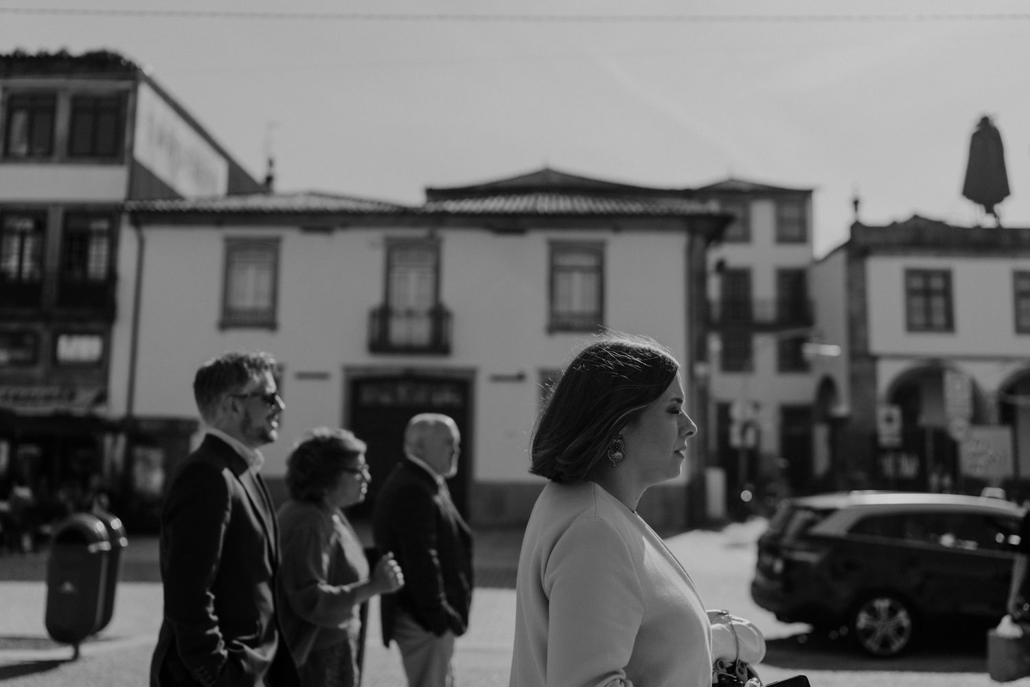Wedding guests gathered outside a church in Porto