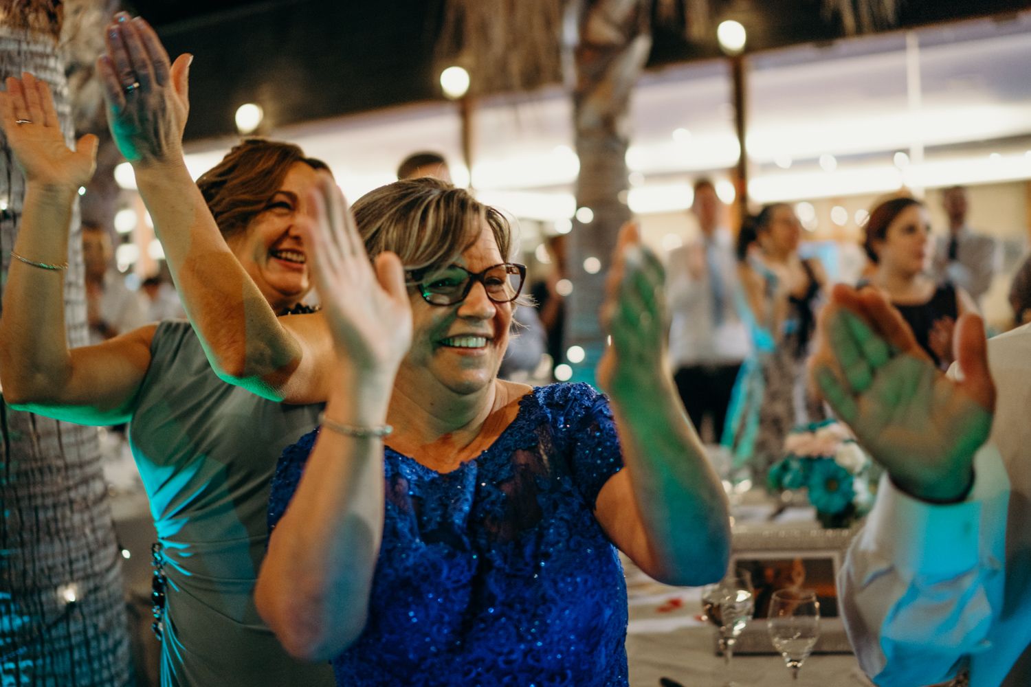 Algarve wedding photographer capturing candid moments at sunset reception in Portugal
