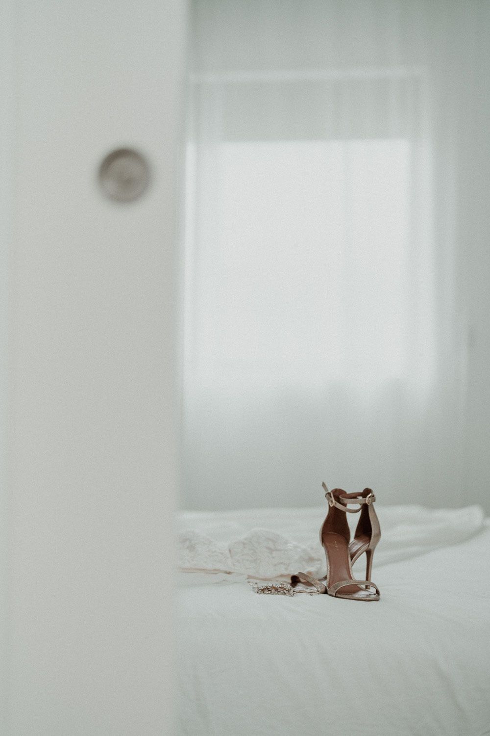 German bride getting ready at Set Lounge, Portugal. Laid-back and intimate moments captured with cinematic photography.