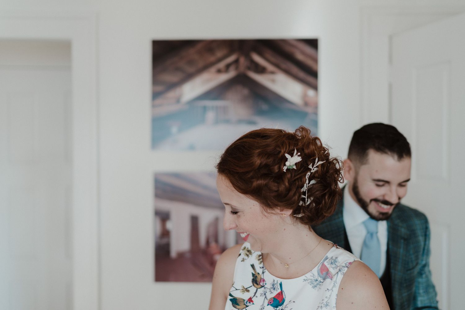 Bride and groom adjusting outfits before their Porto wedding ceremony