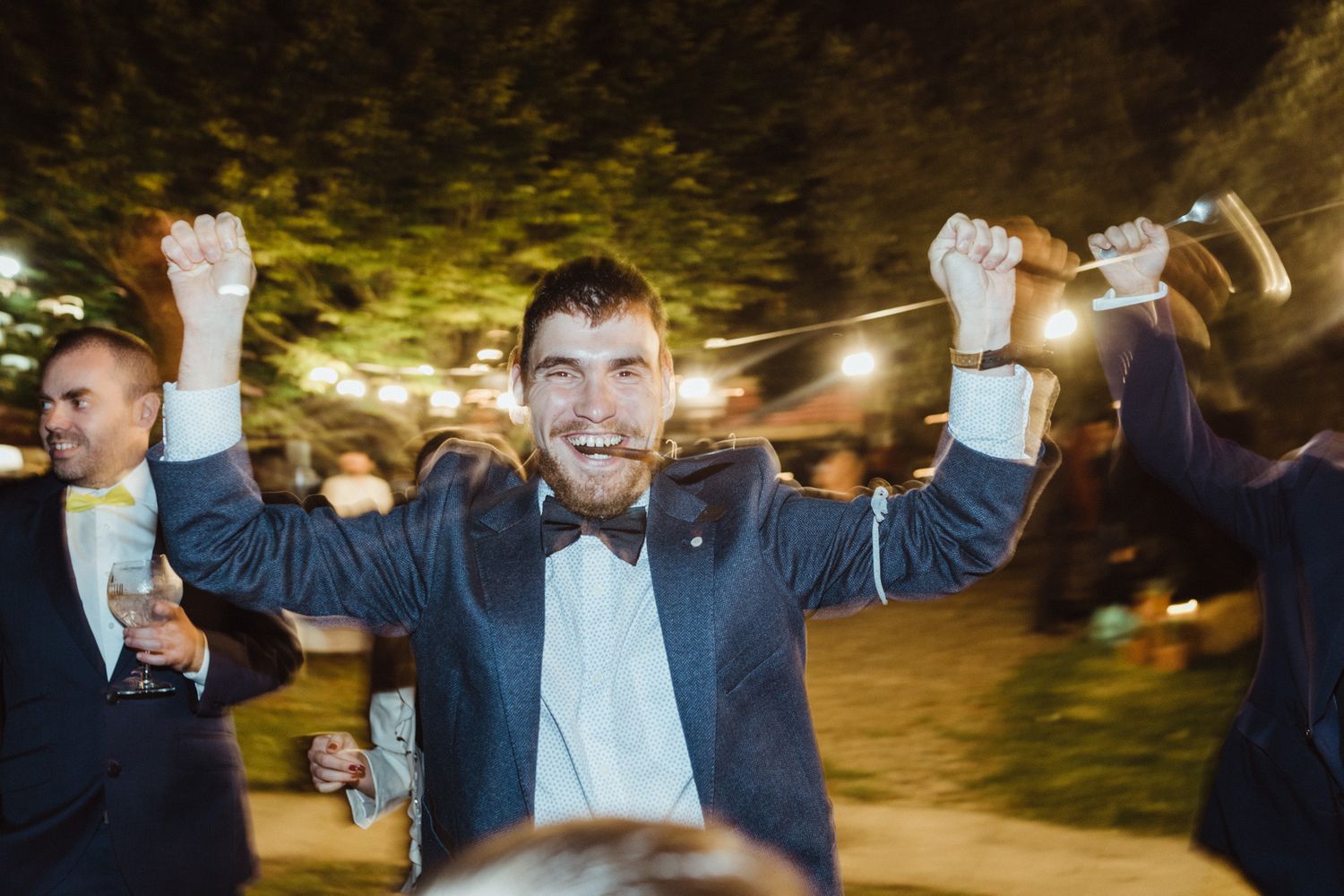 Guests celebrating joyfully together during a wedding in Porto