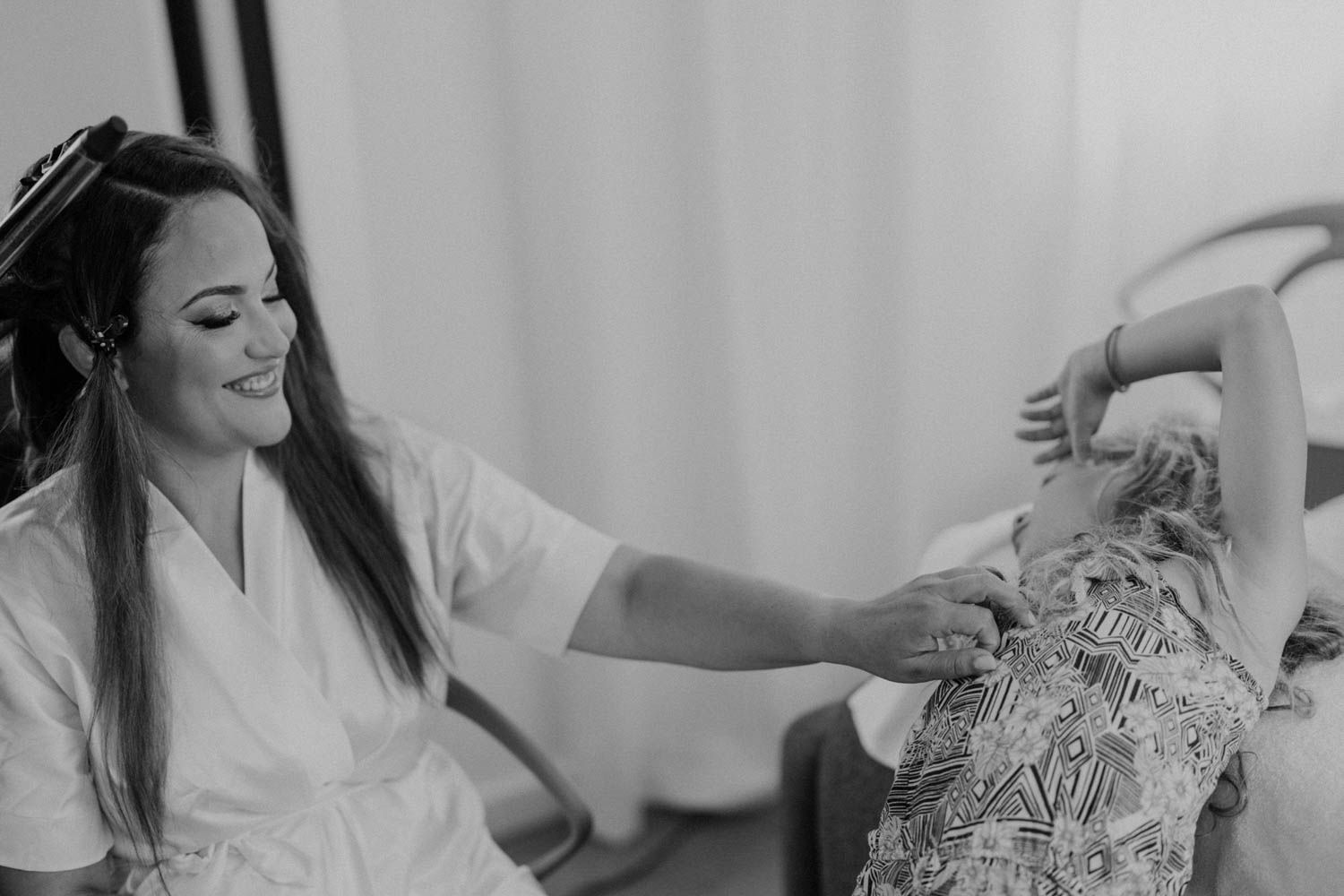 German bride getting ready at Set Lounge, Portugal. Laid-back and intimate moments captured with cinematic photography.