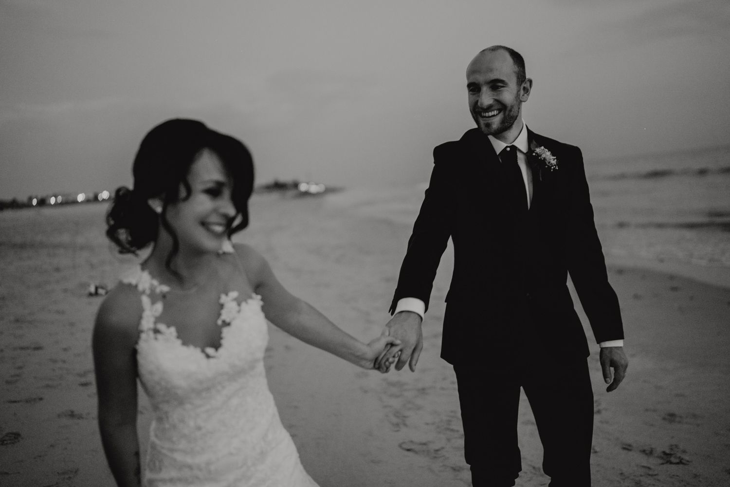 Emotional couple portraits by Algarve wedding photographer during golden hou