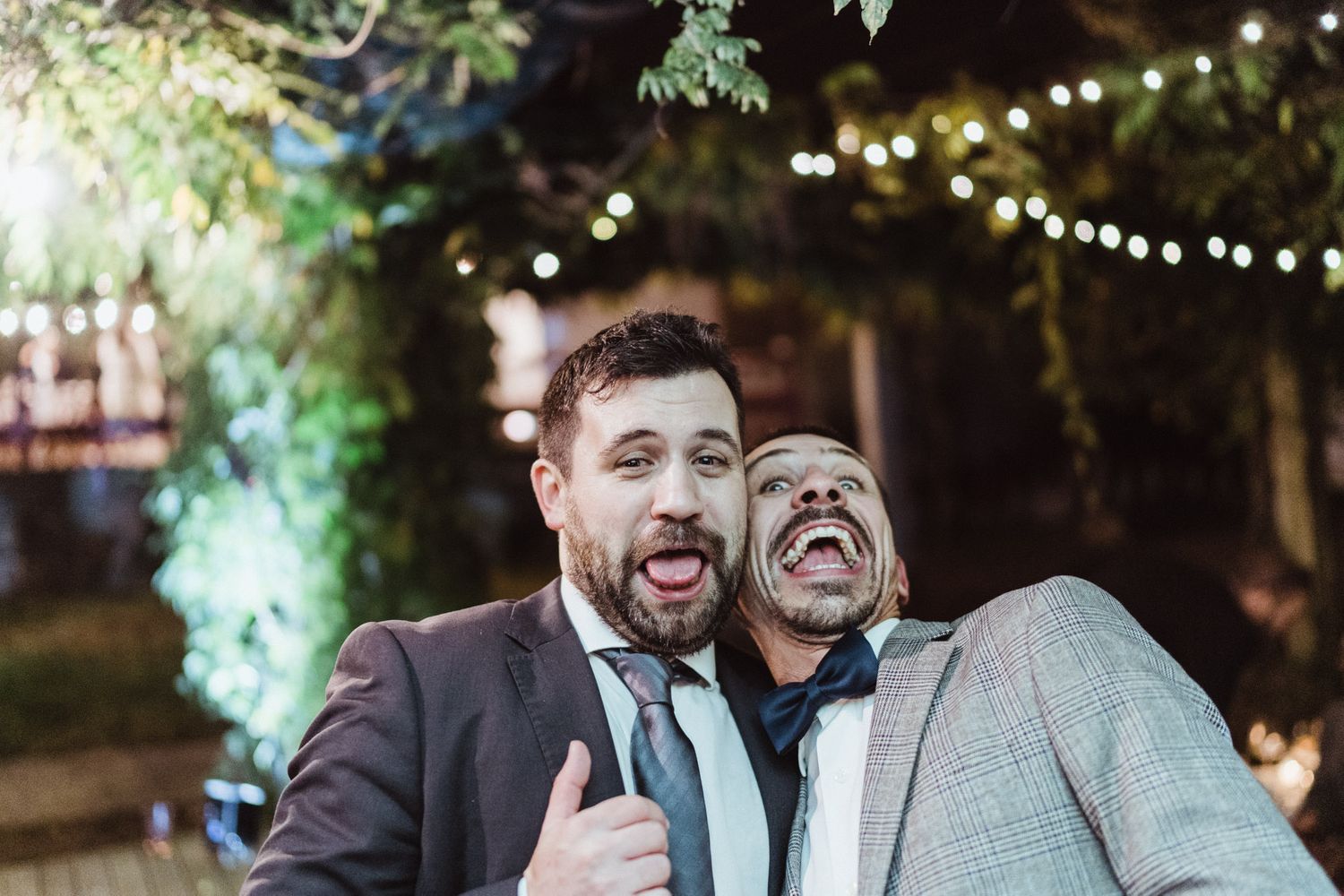 Wedding guest singing joyfully during an intimate wedding celebration in Porto