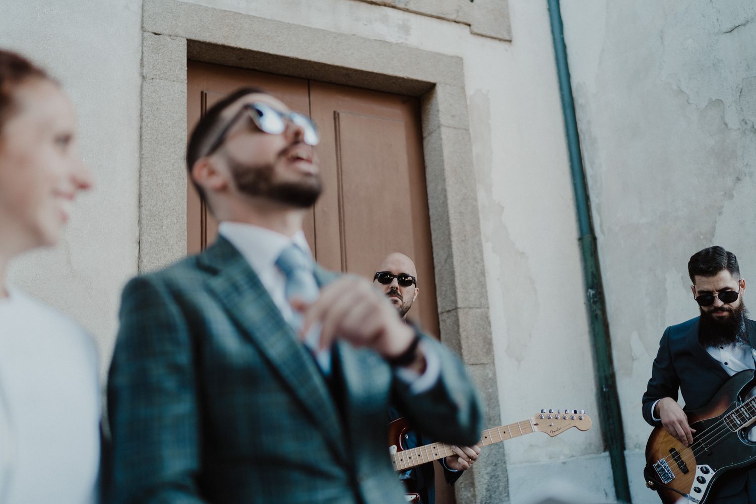 Wedding guests outside a church in Porto after an intimate ceremony