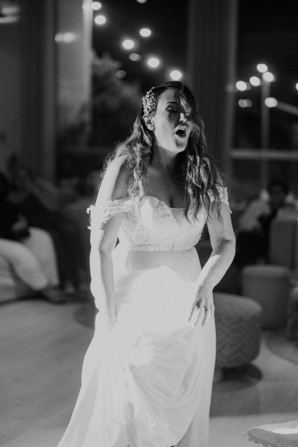Celebration at Set Lounge, Portugal. Guests dancing and enjoying the high-energy vibes of the German-style wedding.