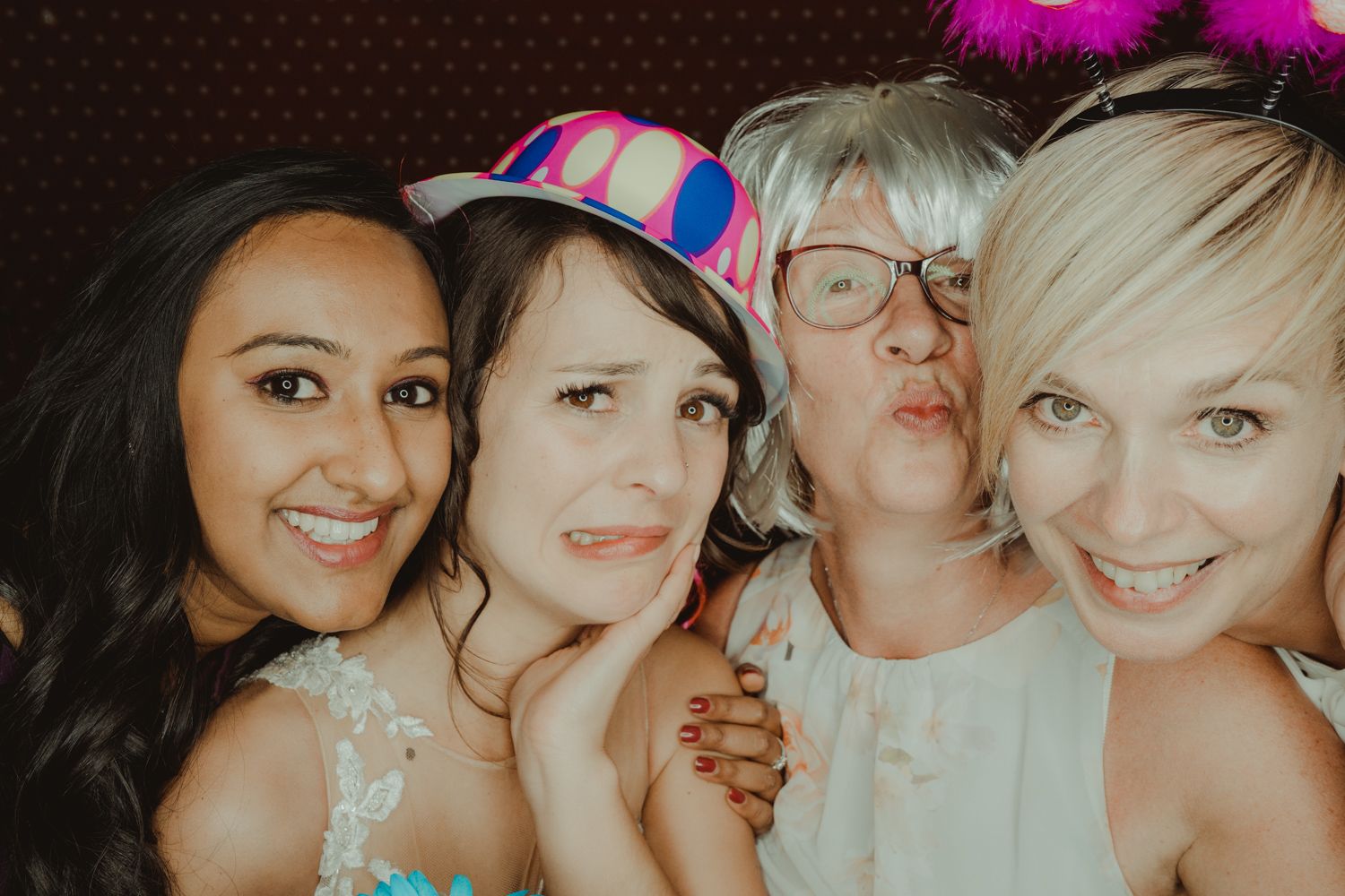 Candid photo booth moment captured by Portugal wedding photographer