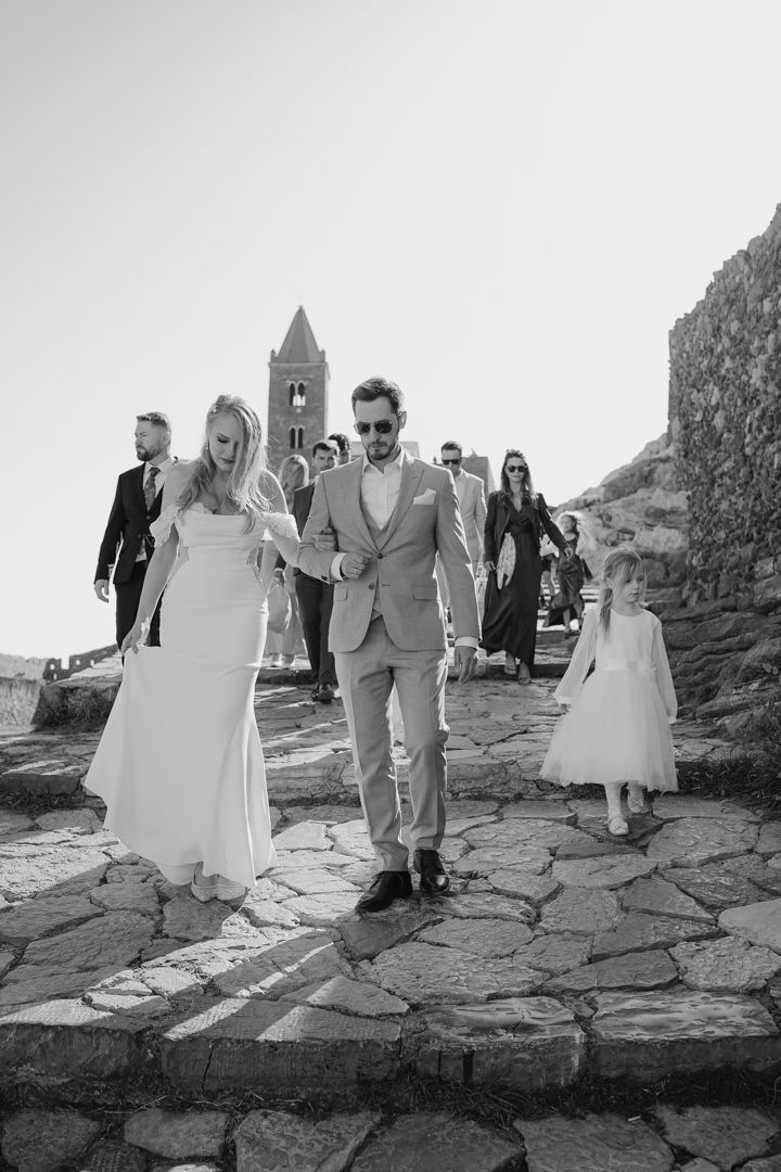 Black and white wedding moment in a historic village in Liguria