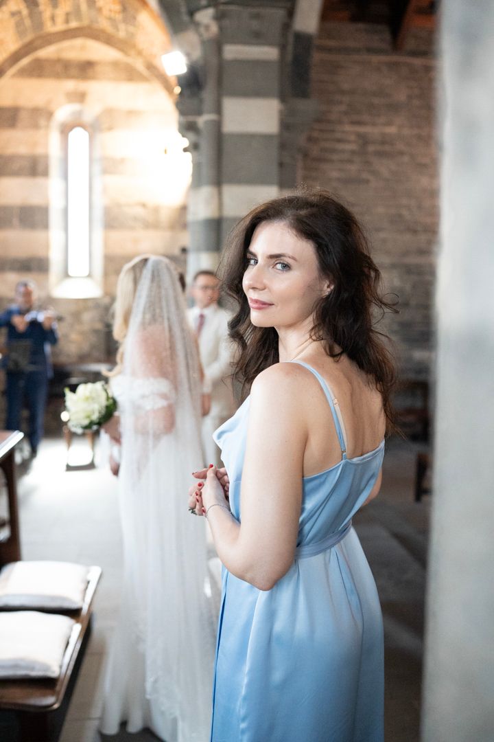 Wedding guest during a church ceremony