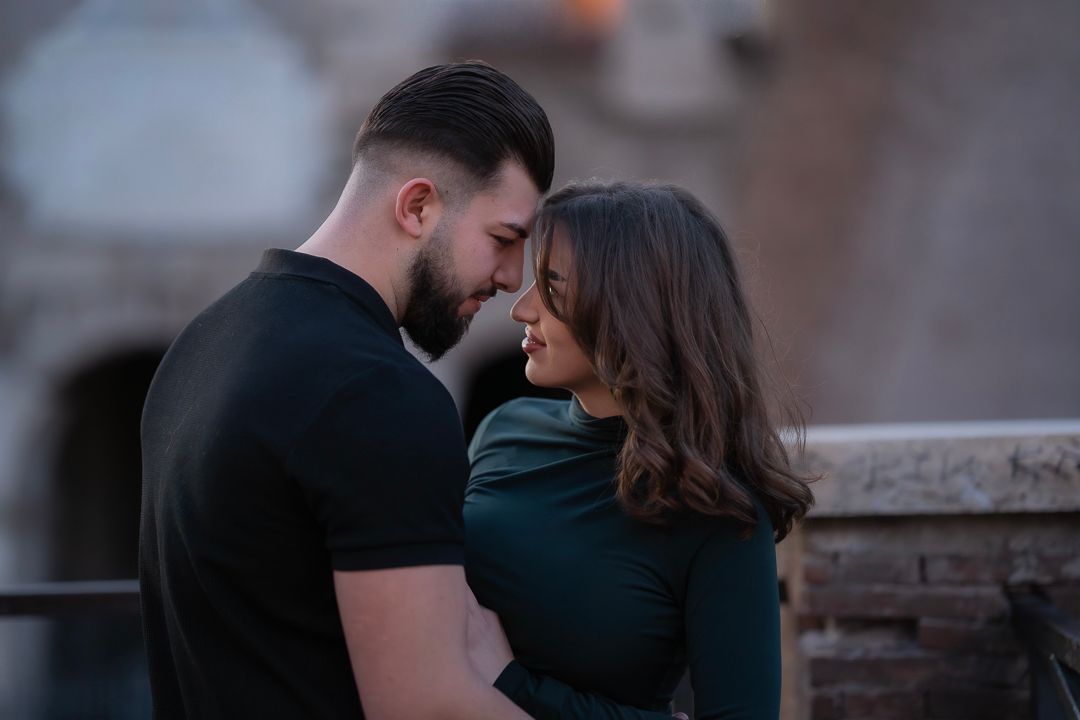 Couple portrait near the Colosseum in Rome, Italy