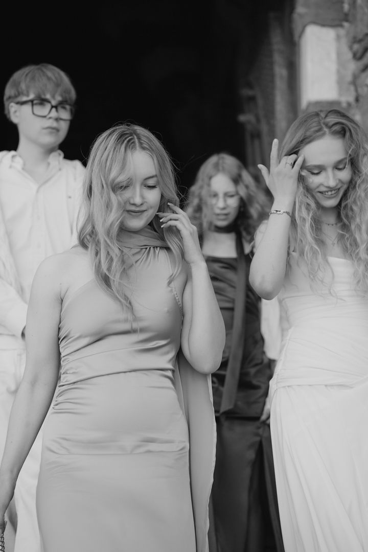Black and white portrait of wedding guests during the ceremony