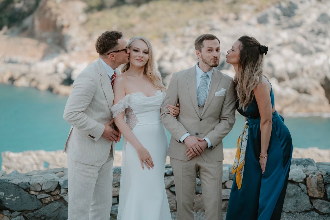 Wedding couple with guests on the Ligurian coast