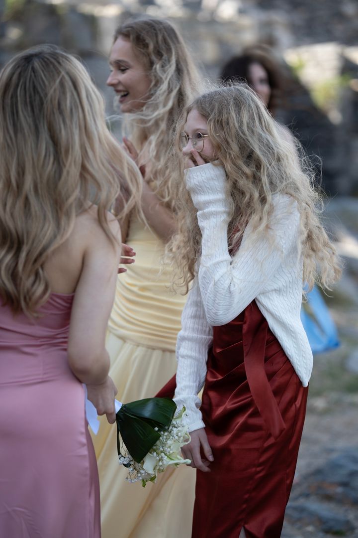 Wedding guests at a coastal celebration in Liguria