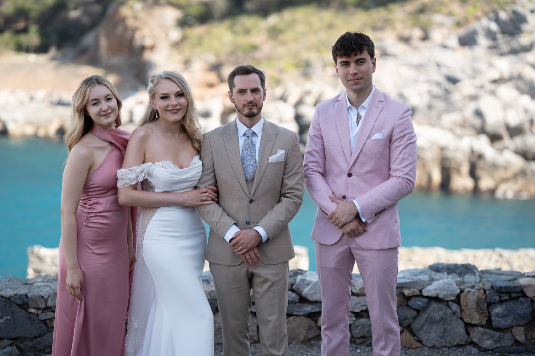 Wedding group portrait overlooking the Ligurian coast