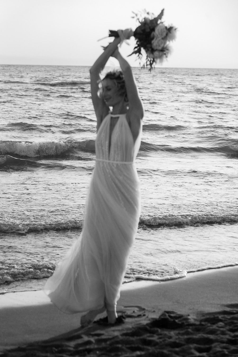 Beach wedding portrait by the sea in Tuscany, Italy