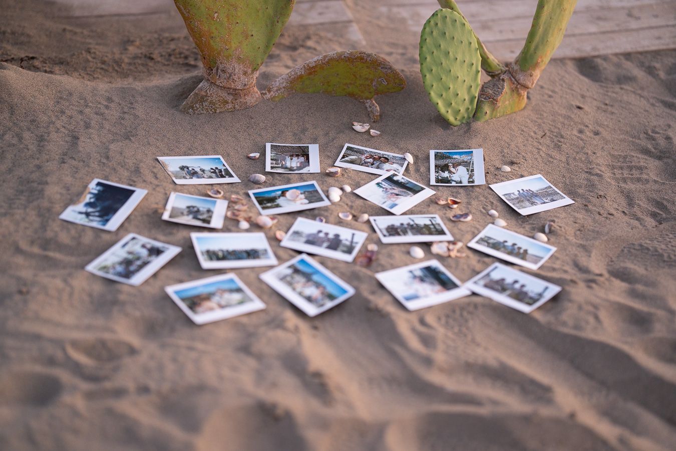 Wedding photo memories displayed on the beach in Tuscany, Italy