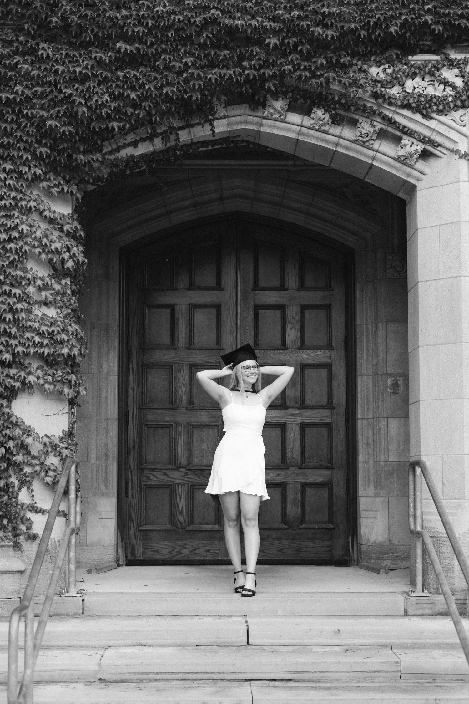 A sequence of black and white photos shows a figure in white against dark doorways creating an artistic silhouette effect.