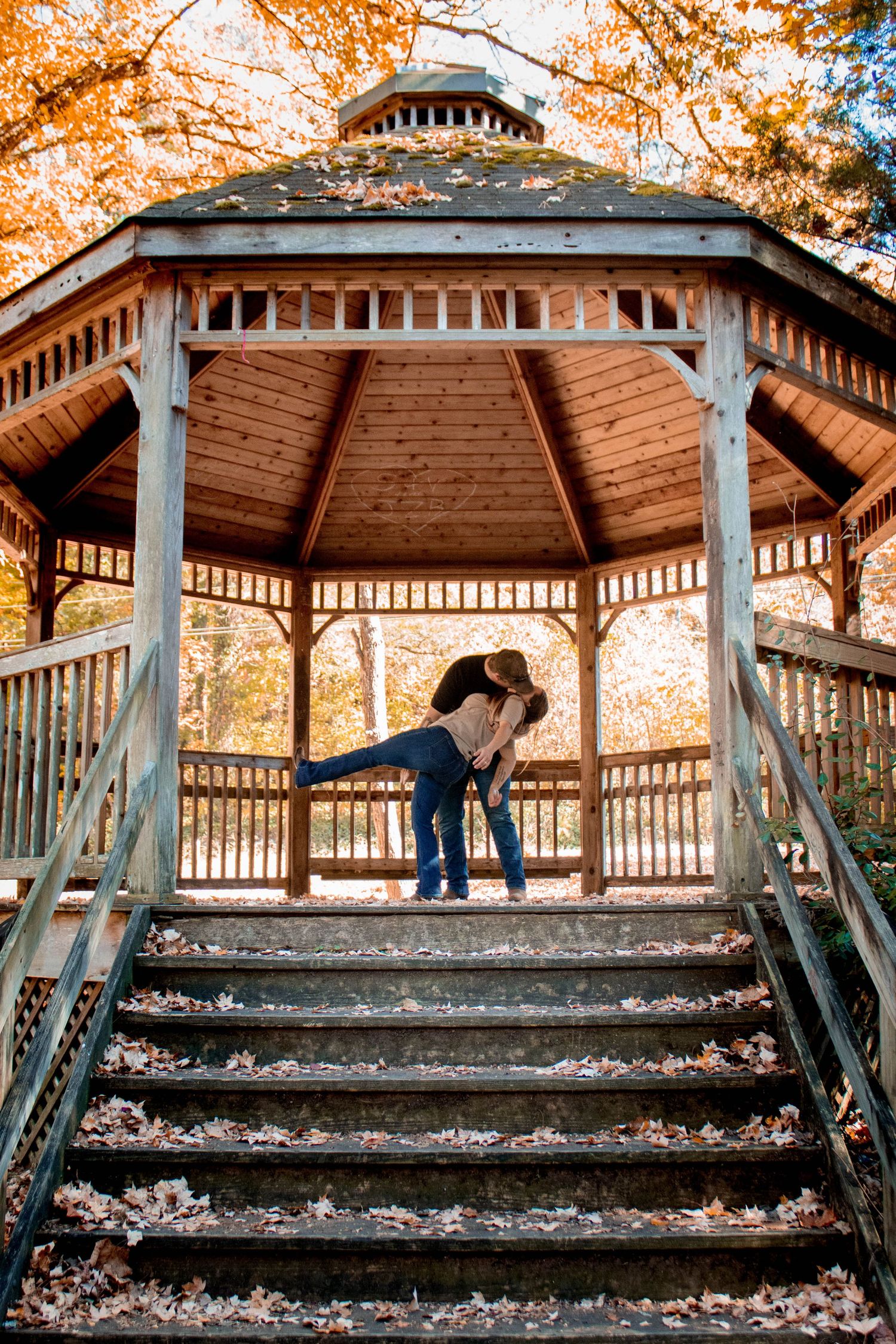 Couple smiling together during an authentic engagement session with Tay Portraits Chattanooga best photographer