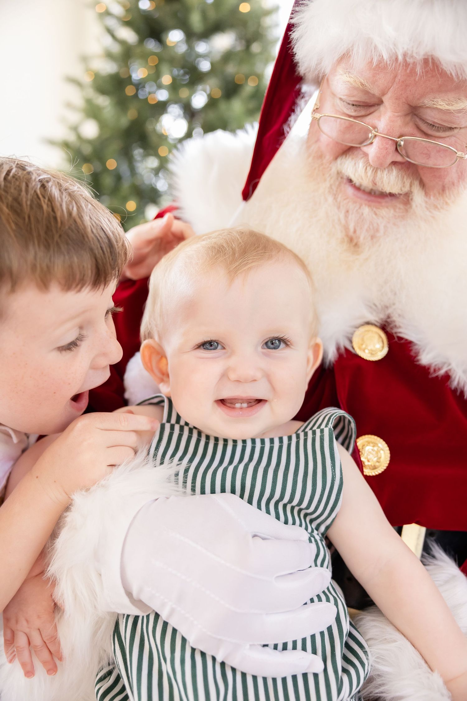 A sequence of four holiday photos showing tender moments between a baby in a striped outfit and someone in a red suit.