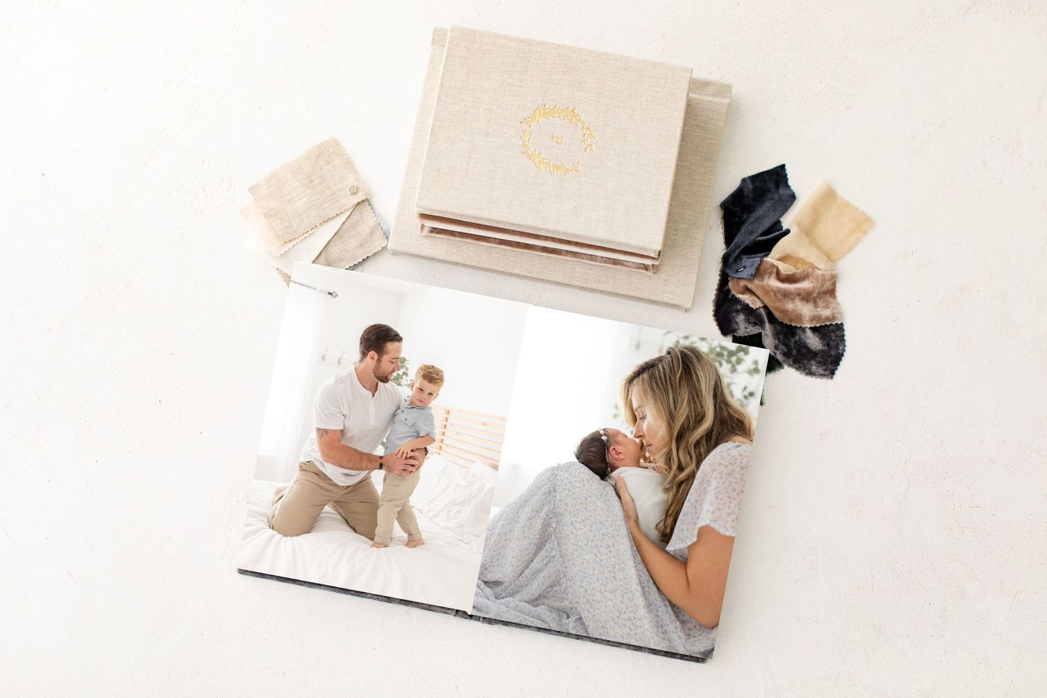 Several photo prints and samples showing lifestyle photography displayed on light surface with neutral tones.