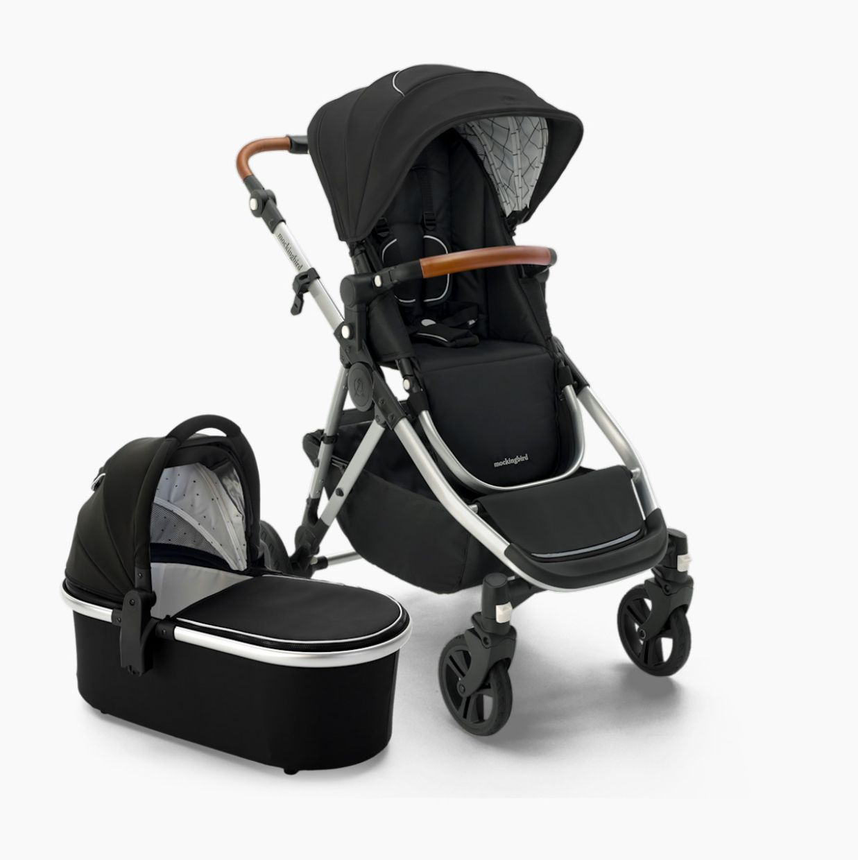 Black baby carriage with adjustable handle and multiple reclining positions shown from different angles in retail product photos.
