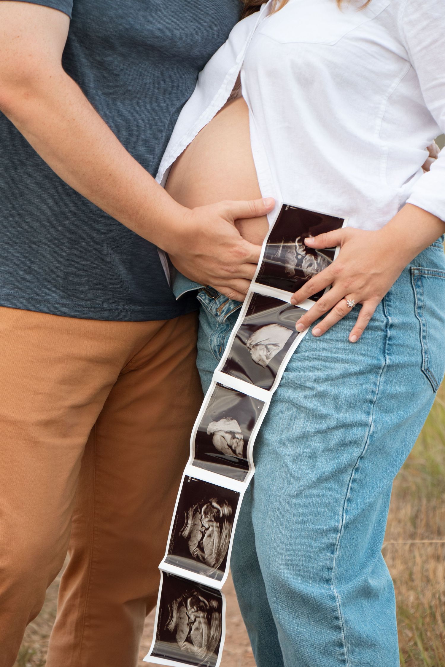 A series of photos showing an ultrasound strip being held against someone wearing jeans and a white shirt.