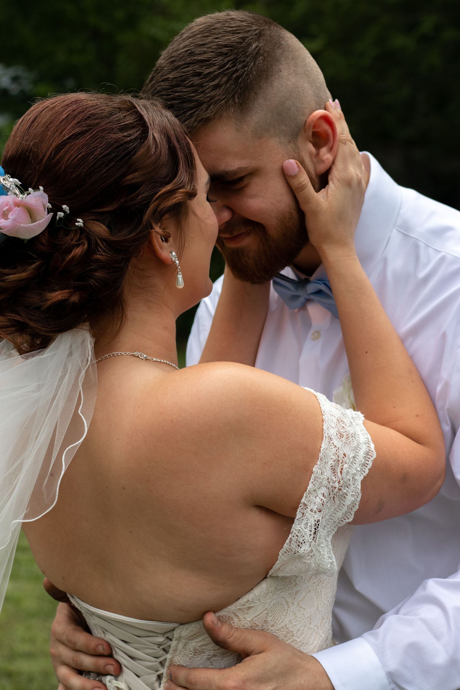 Intimate wedding couple portrait sequence showing tender moments outdoors.