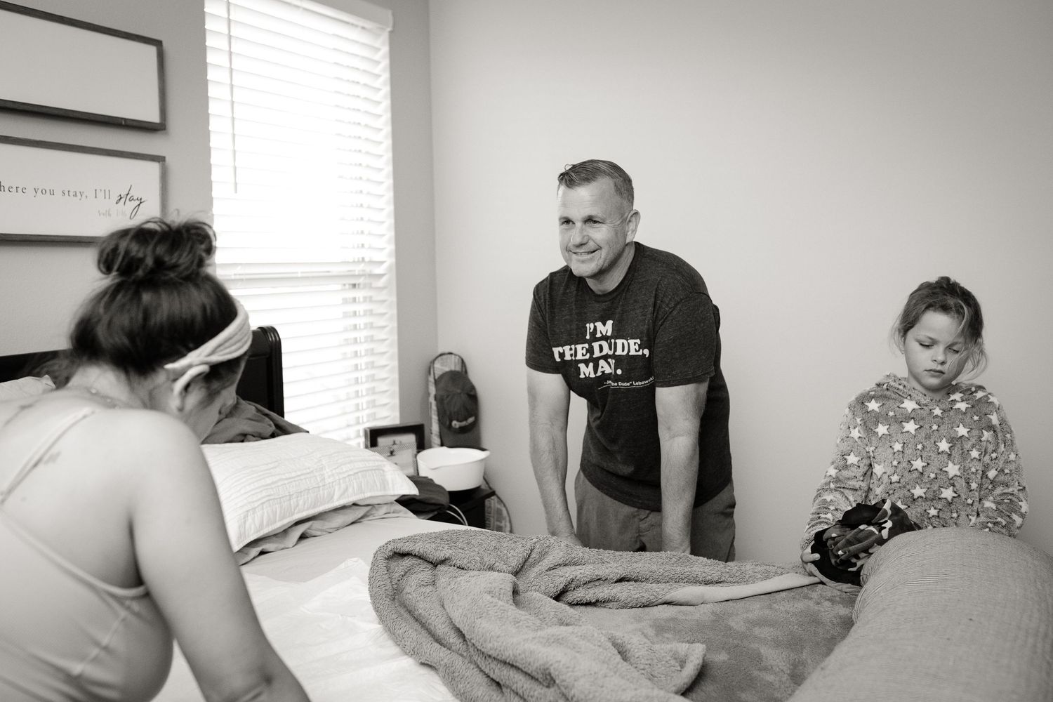 A series of black and white photographs documenting moments in a sunlit bedroom.