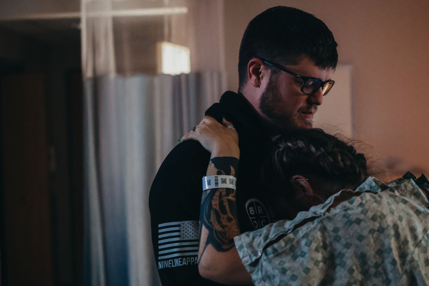 Healthcare workers in a hospital setting focused on patient care.