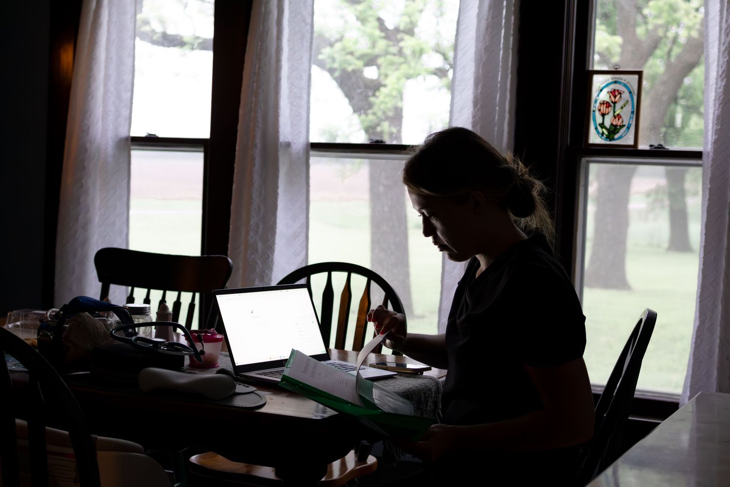 Sunlit room prepared for home birth with windows and natural lighting.
