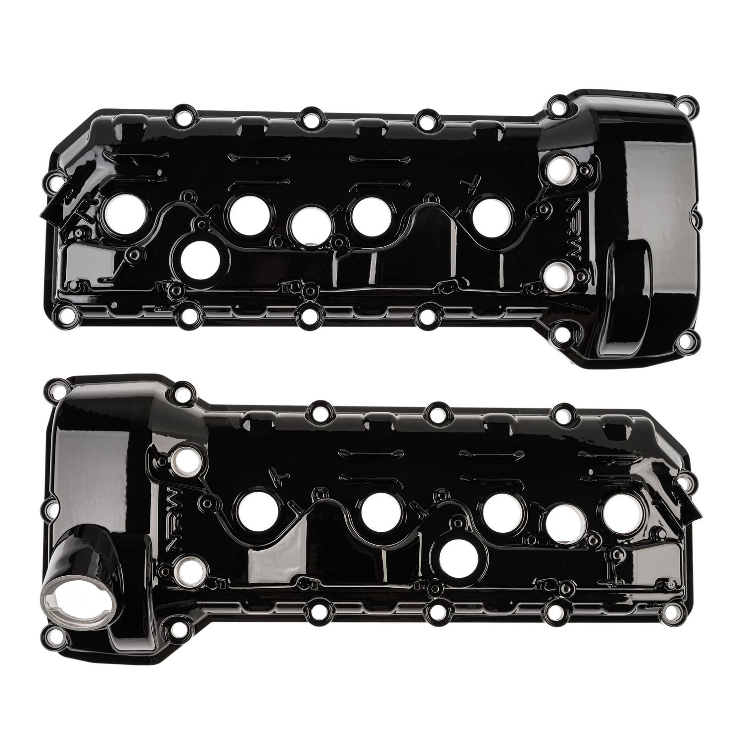 Black valve covers for BMW engine with white bolt holes and mounting points aligned in a symmetrical pattern.