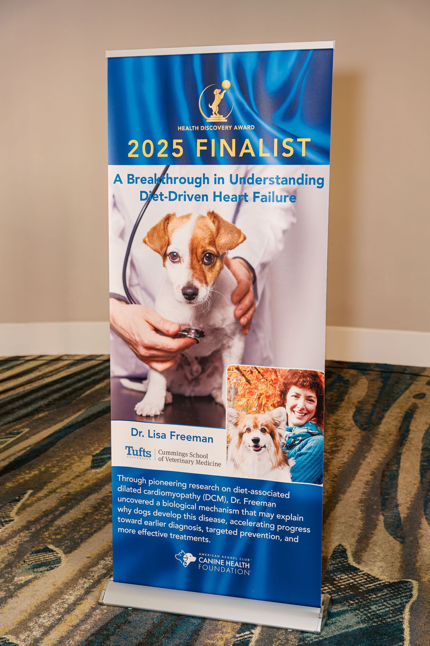 A 2025 finalist banner display featuring a Jack Russell Terrier and veterinary research about heart failure at Tufts.