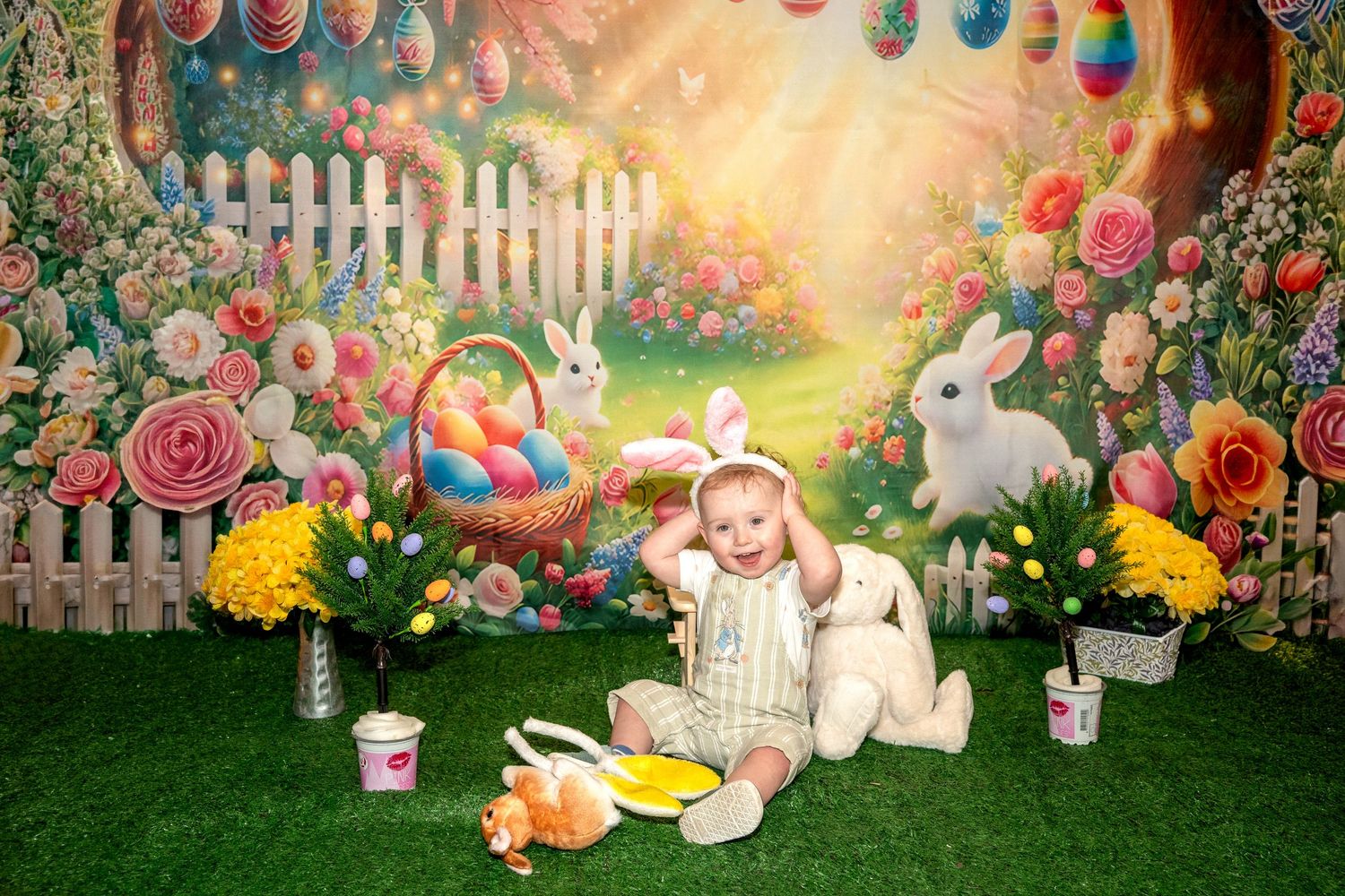 Whimsical Easter garden scene with bunny, basket, colorful roses, white picket fence and glowing magical lighting.
