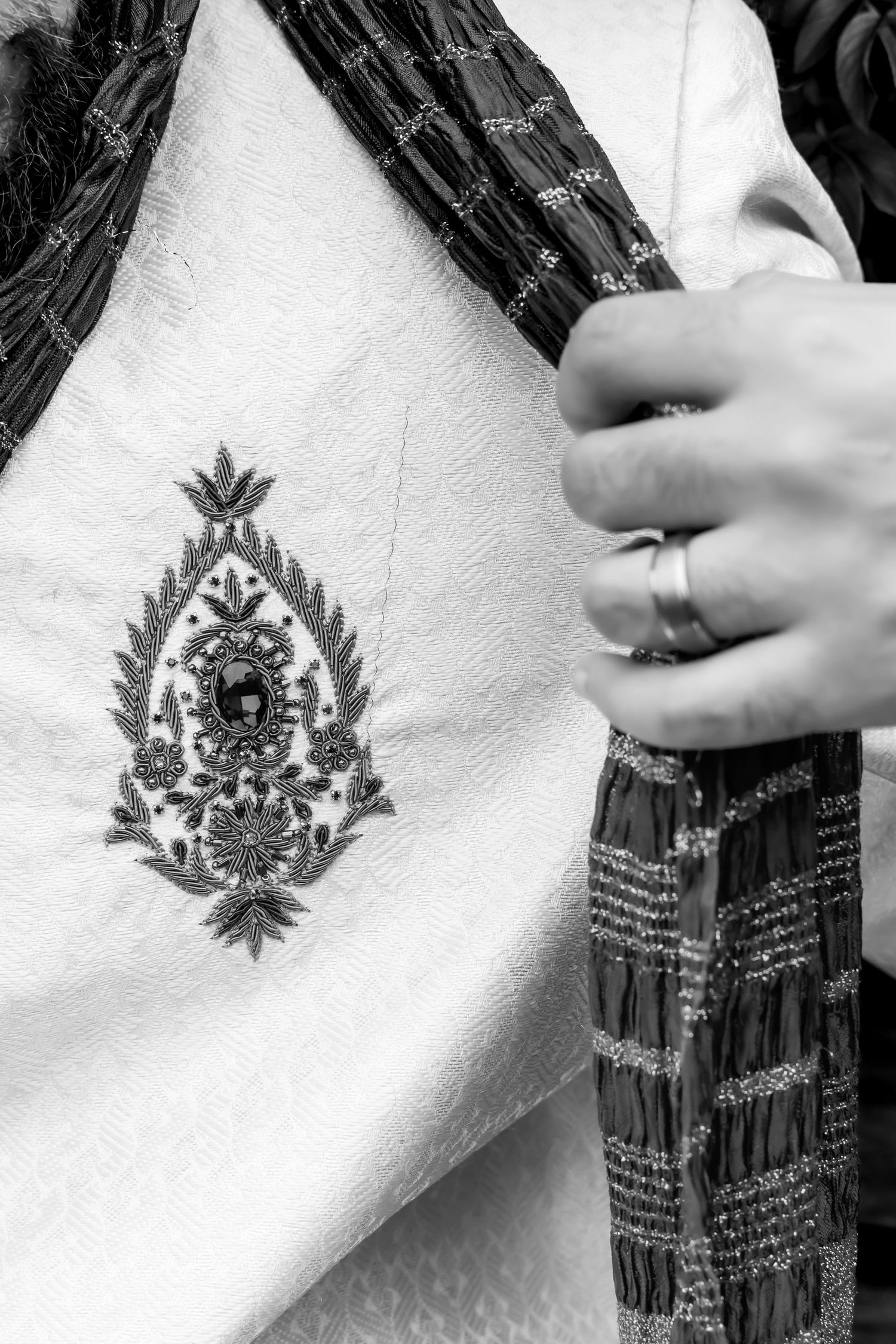 Step by step process showing a temporary tattoo being applied to skin using water and pressure application technique. |PHL, PA Wedding