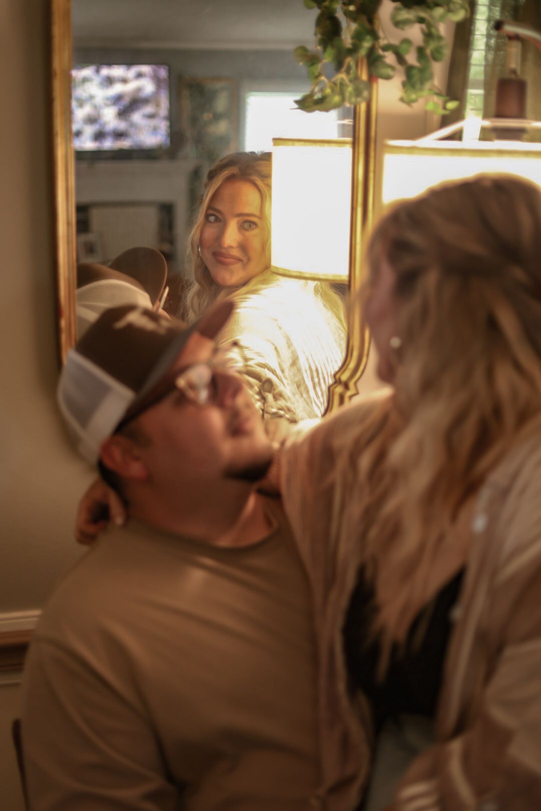 A loving couple sharing an intimate moment in their home.