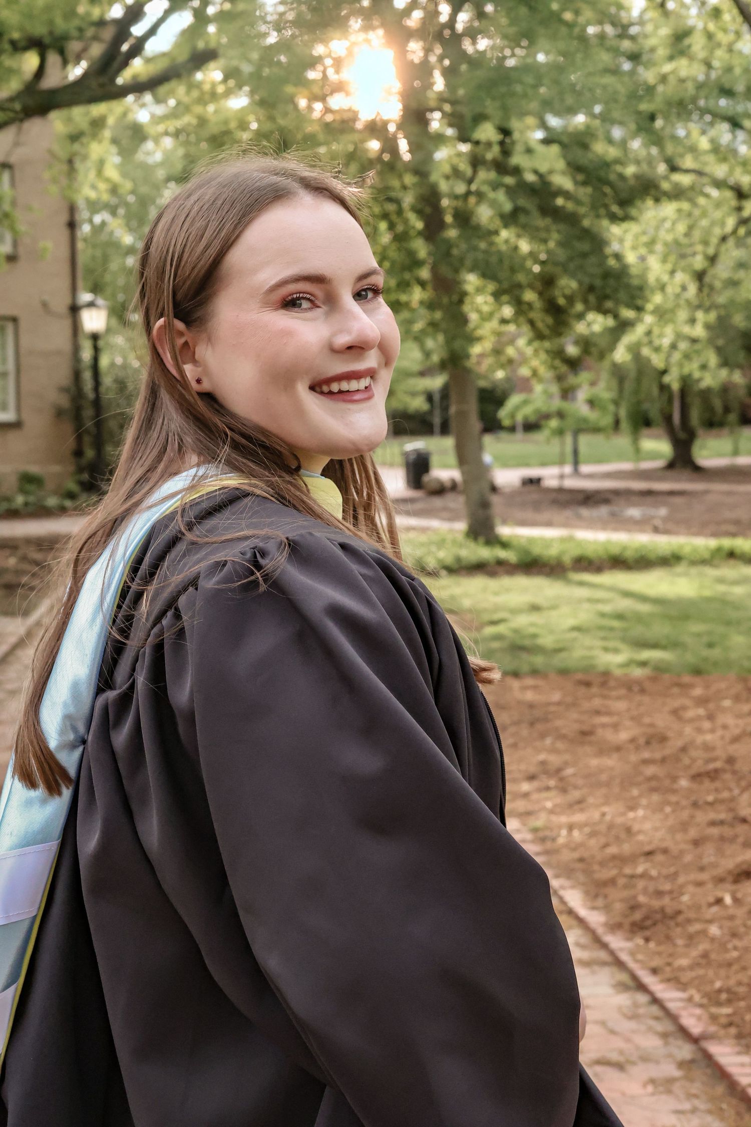 Candid graduation photoshoot series outdoors on a sunny day.