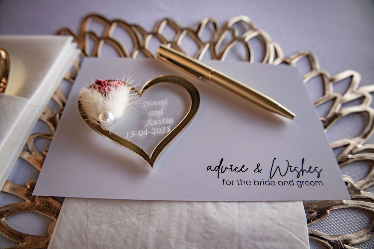 Close-up of elegant wedding stationery with decorative details.