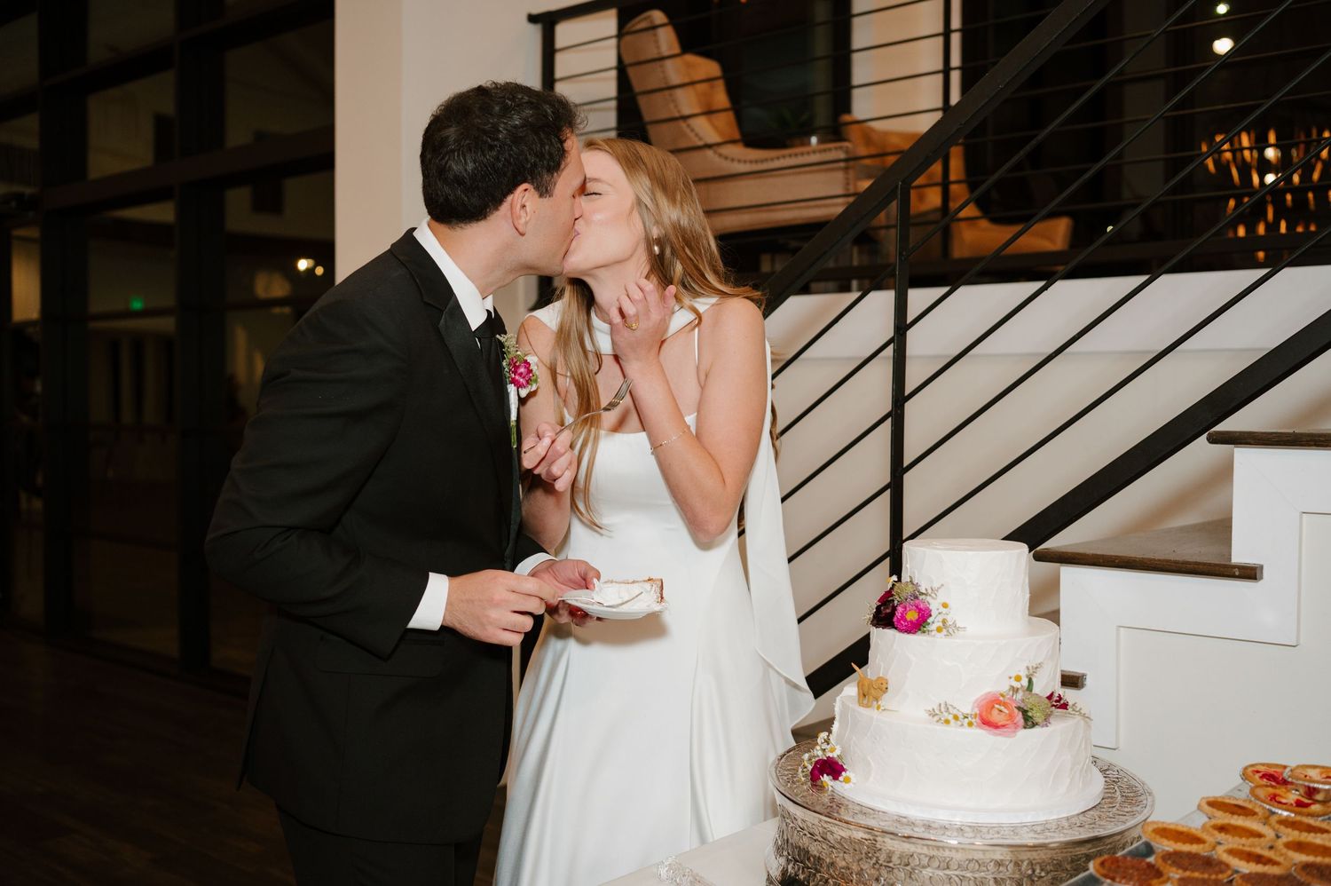 Wedding reception moments showing cake cutting and celebrations indoors.