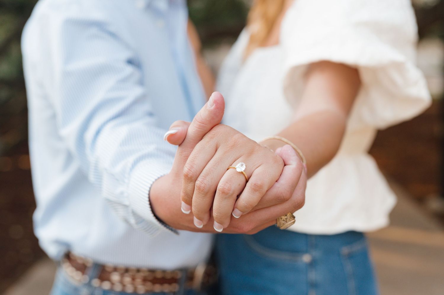 A series of photos showing hands clasped together in an intimate embrace against a soft blurred background.