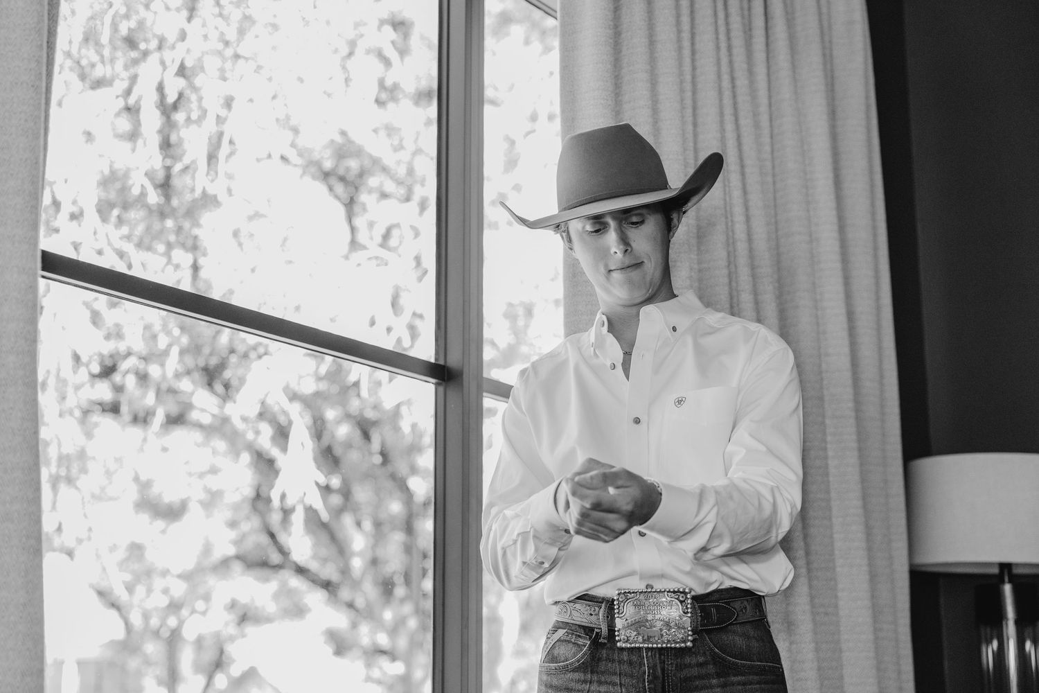 A black and white photo collage shows five vintage portraits of people in western attire and cowboy hats.