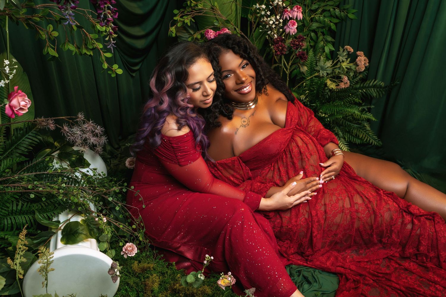 Five connected photos show subjects in elegant red lace gowns posing against a dark floral backdrop.
