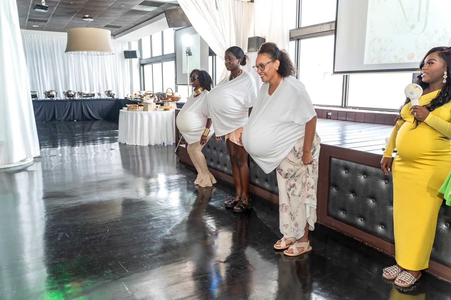 Modern event space with leather seating and stylish decor for a special occasion.