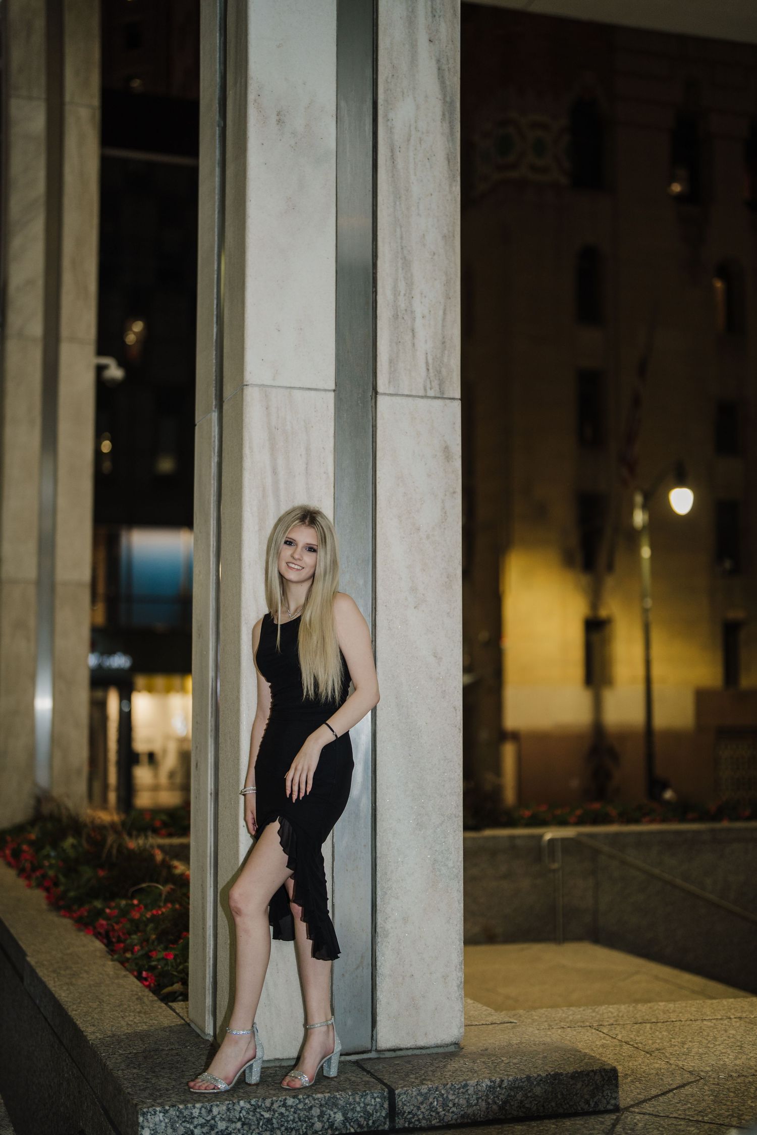 Nighttime architectural photos featuring columns and urban lighting creating dramatic shadows.