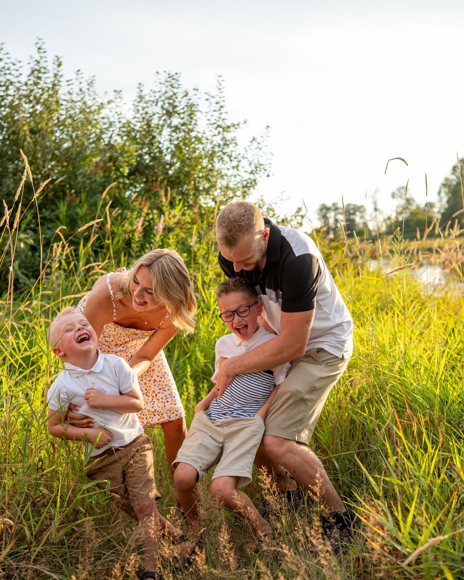 Series of intimate family moments captured in natural setting with golden light.